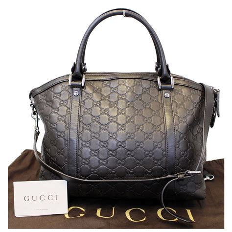 gucci dark brown leather bag.